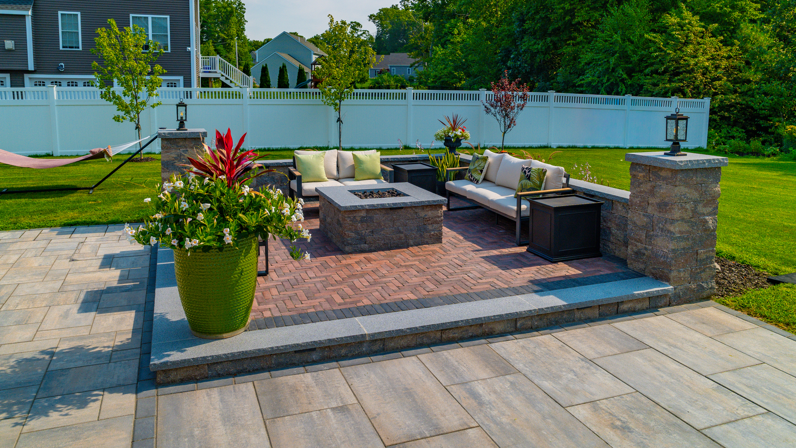 Custom Raised Patio with Fire Pit Design & Construction in Milford, MA